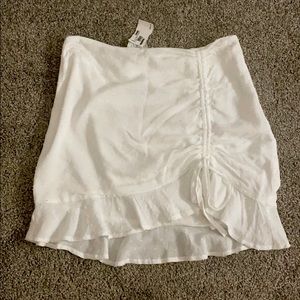 White ruffle skirt with cinch and tie
